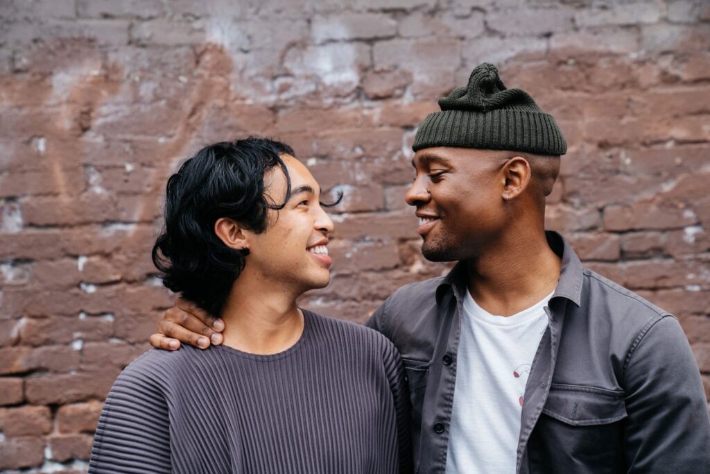 Image of the same couple looking at each other smiling. Showing the positive outcome of getting a prepare enrich assessment in Atlanta, GA. Where an Atlanta relationship counselor can help navigate relationship problems.